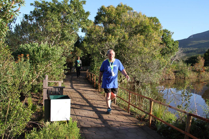 Johann Swanepoel wearing a Tau Shirt on a parkrun